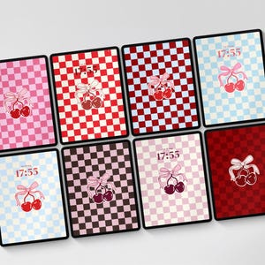 May include: Eight digital tablets arranged in two rows, each displaying a unique checkerboard pattern background. Every screen features a graphic of two cherries tied with a ribbon and the digital time 17:55 displayed in a simple font.