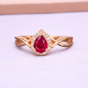 Pear Ruby Engagement Ring, Rose Gold Halo, Twist Band Promise Ring