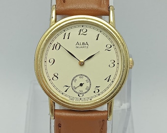 Seiko, Alba, cuarzo, segundero pequeño, vintage, reloj unisex, analógico, Japón, tono dorado, correa de cuero, clásico, V253 0010, reloj de vestir