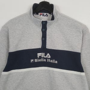 May include: White ceramic mug with a black handle, featuring the text "But First, Coffee" in a handwritten font. Ideal for a morning cuppa, the mug likely holds 340-450ml.