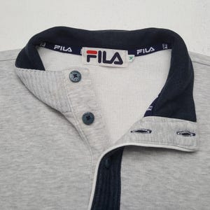 May include: A distressed wooden sign, reading "Welcome to our home" in white. The sign has a rustic finish, ideal for adding a welcoming touch to any home's entrance.