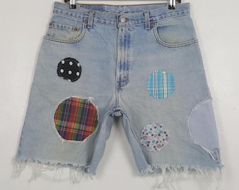 Pantalones cortos vaqueros Levi's vintage con parches de mezclilla