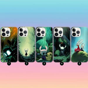 May include: Five phone cases with unique designs featuring characters from a video game. Each case has a different background, including forest scenes and abstract designs. The cases are in various colors, including green, orange, and blue.