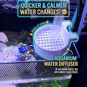 May include: White aquarium water diffuser with the text "QUICKER & CALMER WATER CHANGES!" and "AQUARIUM WATER DIFFUSER". The diffuser is designed to reduce mess and substrate disturbance during water changes.
