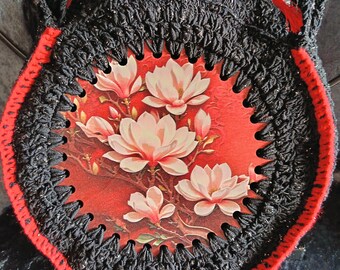 Round red and black bag, design on wood: lotus flowers