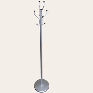 May include: A silver metal coat rack with a round base and multiple hooks. The rack has a central pole with curved arms extending outwards, each ending in a black ball. The base is circular and provides stability.