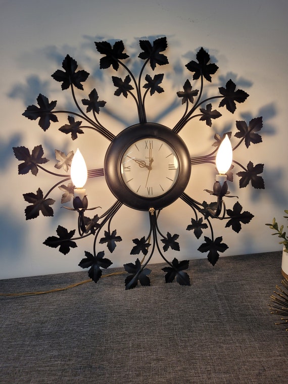 Sunburst sconce sale