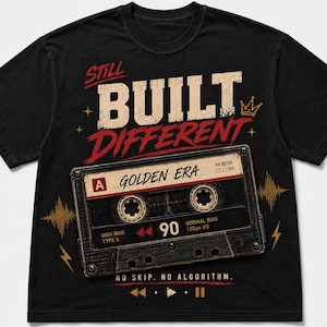May include: Black t-shirt with the text "STILL BUILT DIFFERENT" in white and red, and a cassette tape graphic. The cassette tape says "GOLDEN ERA" and "90". The shirt also has the text "NO SKIP. NO ALGORITHM."