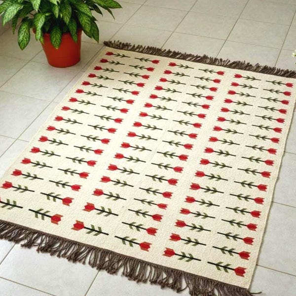 Boho handvävd blommig textil – ulljute kelimtyg, rustik heminredning, hantverksväv