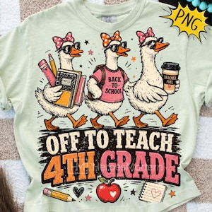 May include: A light green t-shirt featuring a graphic of three white geese wearing sunglasses and pink polka-dot bows. The geese carry school supplies and a coffee cup. The text reads OFF TO TEACH 4TH GRADE, accompanied by a red apple and pencil.
