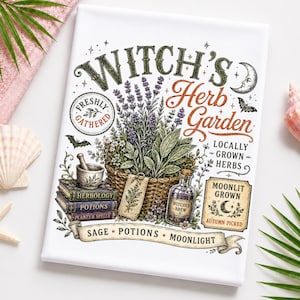 May include: A white rectangular print featuring the text Witch's Herb Garden, with illustrations of a woven basket filled with lavender and sage, a mortar and pestle, stacked books labeled Herbology, Potions, and Plants & Spells, and a bottle.