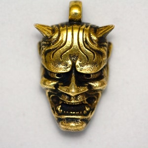 Hannya skull brass pendant