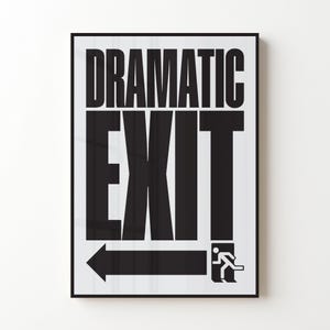 May include: A framed black and white print with the words "DRAMATIC EXIT" in bold, uppercase letters. Below the text is an arrow pointing left and a stick figure running towards an exit.