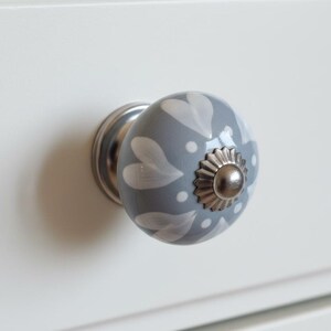 Ceramic Drawer Knobs | Grey-Blue with White Hearts & Silver Centre | Sold in Pairs