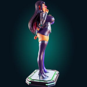 May include: A stylized figurine of a character with long dark hair, wearing a dark purple outfit consisting of a fitted top, a short skirt, and high-heeled boots. The figure stands on a rectangular base with green accents and a metallic finish.