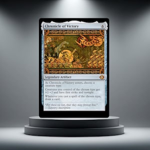 May include: A black Magic: The Gathering card, "Chronicle of Victory", on a grey pedestal. The card has a detailed illustration in gold, brown, and green. Text on the card describes its function as a legendary artifact.