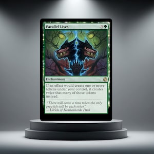May include: A green Magic: The Gathering card named "Parallel Lives." The card shows a dark illustration of two snarling wolf-like creatures with glowing eyes, linked by blue energy. The card text describes an enchantment that doubles token creation.