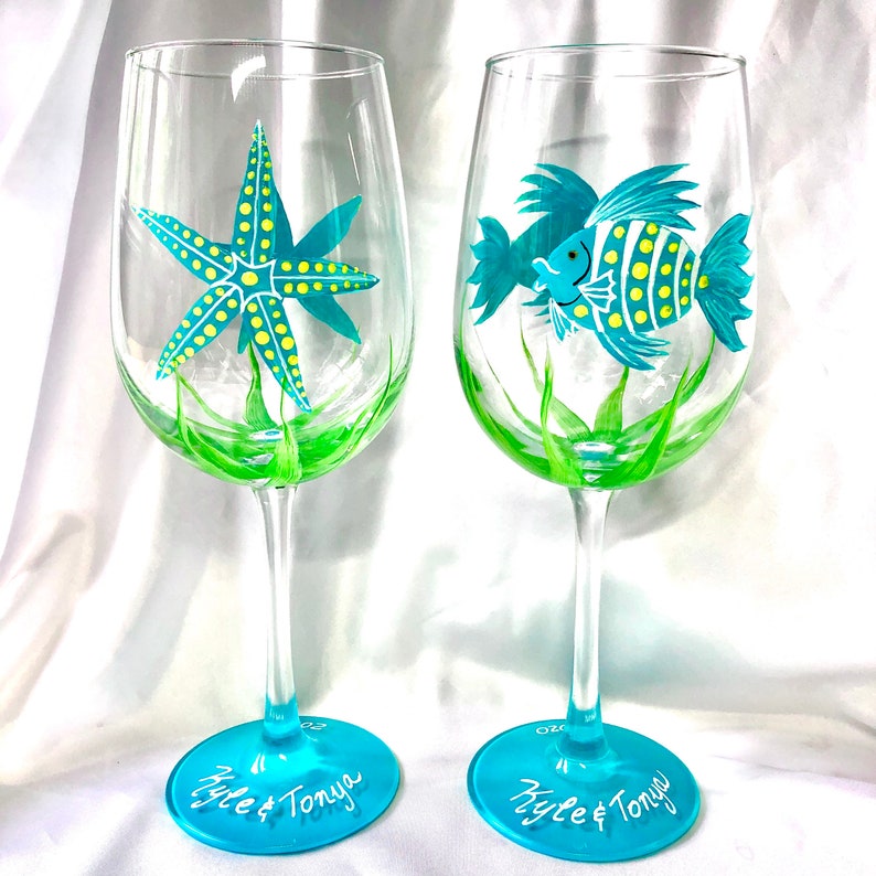 Fish and starfish hand painted wine glasses.