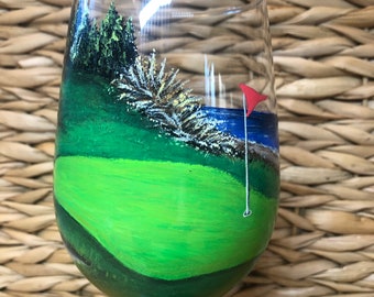Golf themed hand painted wine glass.