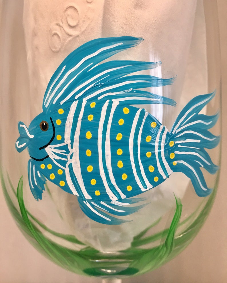 Fish and starfish hand painted wine glasses.
