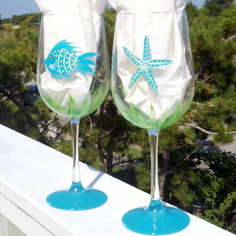 Fish and starfish hand painted wine glasses.
