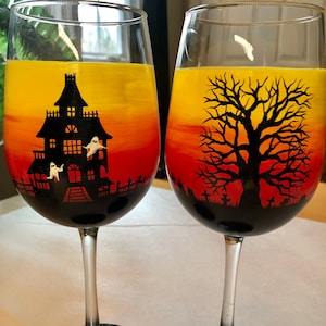 Haunted Halloween hand painted wine glasses.