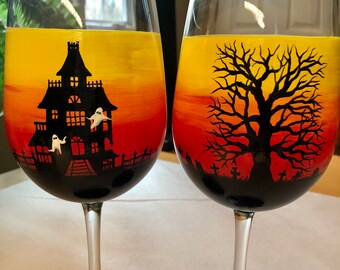 Haunted Halloween hand painted wine glasses.