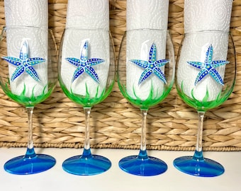 Eight starfish hand painted wine glasses.