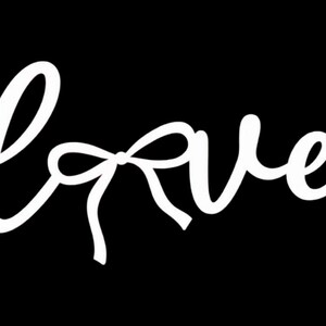 May include: White cursive "love" text with a bow detail on a black background. The word is written in a flowing, elegant script, with the bow replacing the "o". The image is simple and graphic.