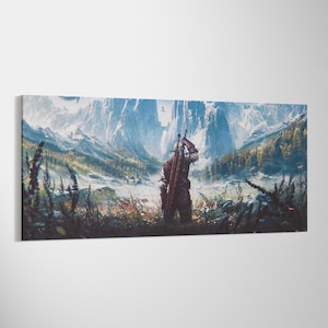 May include: A rectangular canvas print featuring a fantasy landscape with a central figure seen from behind, wearing leather armor and carrying two swords on their back. The scene depicts snow-capped mountains, a valley, and dark foliage.