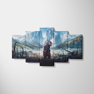 May include: A five-panel canvas wall art set depicting a fantasy landscape with a central figure carrying a large sword on their back. The scene features a vast valley, snow-capped mountains, a forest, and a field of wildflowers under a blue sky.
