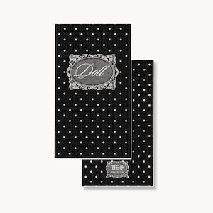 May include: Two rectangular black cards featuring a white polka dot pattern. The larger card displays an oval frame with the word Doll in script. The smaller card features a rectangular frame with the text DES ABLEVE CO in a gothic font.