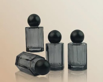 50ml Glass Spray Bottle for Perfume, Lotion & Essential Oil – with a Black Solid Wood Cap, Portable, Practical, Stylish and Textured.