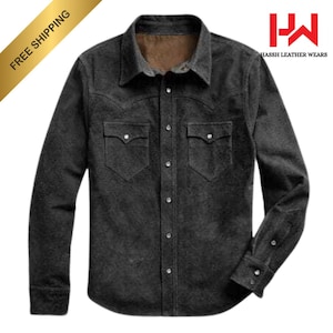 May include: A dark grey button-down shirt with two chest pockets and a collared neckline. The shirt has a brown interior lining and the text "Hassh Leather Wears" is visible.