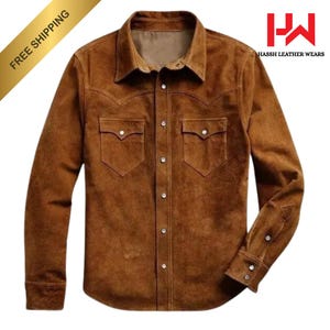 May include: A brown suede shirt with a button-down front, two chest pockets, and a classic collar. The shirt has decorative stitching on the shoulders and pockets. The brand name "Hassh Leather Wears" is visible in the upper right corner.