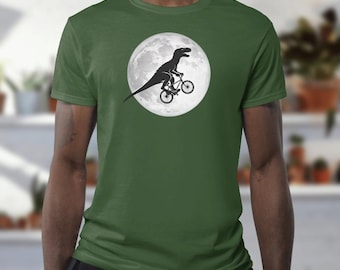 Velociraptor on Bicycle Moon T-Shirt, Funny Dinosaur Cycling Under Full Moon Graphic Tee, Jurassic Bike Art, Retro Sci-Fi Dino Shirt