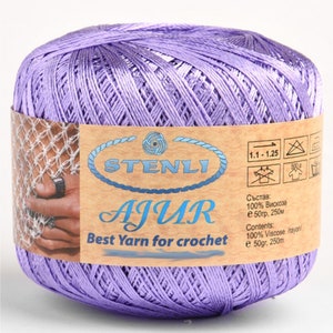 May include: A skein of lavender-colored yarn labeled "STENLI AJUR Best Yarn for crochet" with care instructions and composition information in both English and Russian. The yarn is 100% viscose and comes in a 50 gram, 250 meter skein.