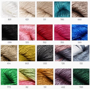 May include: A color chart of 20 different yarn colors. The colors include white, beige, teal, black, pink, red, blue, brown, yellow, gray, green, and gold.