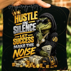 May include: Black pillow with a graphic of an alligator wearing sunglasses, a hoodie, and gold jewelry, holding money. The text reads "Hustle in Silence, Let Success Make the Noise" in gold and white.