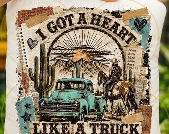 May include: A white square pillow featuring a graphic print of a turquoise vintage truck, a person riding a horse, a cactus, and mountains under a sun. The text reads I GOT A HEART LIKE A TRUCK and Some Ride Like Some Just Feel It on a collage background.