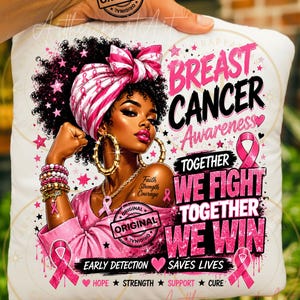 May include: A white square pillow featuring a graphic of a person with dark curly hair wearing a pink headwrap and gold hoop earrings. The design includes pink breast cancer awareness ribbons and the text Breast Cancer Awareness Together We Fight Together We Win Early Detection Saves Lives Hope Strength Support Cure.