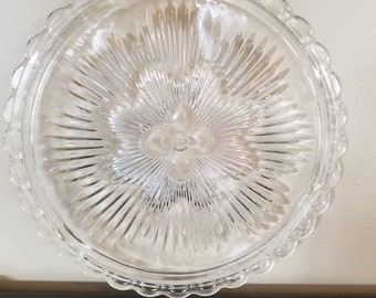 Vintage Clear Footed Cake Plate with Center flower and Scalloped Edge.