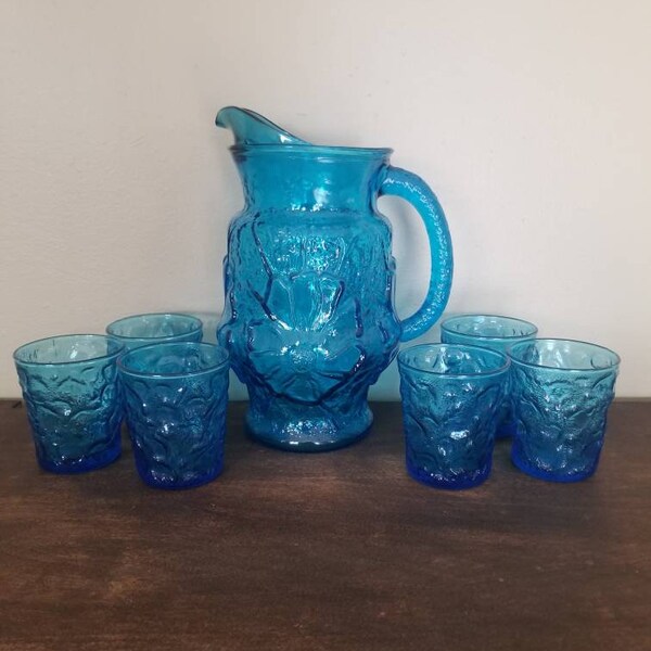 Vintage Hazel Atlas Aqua Blue Glass Pitcher with Rainflower design and Set of 6 Matching Cups.