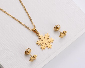 Pendientes y collar navideños de copo de nieve