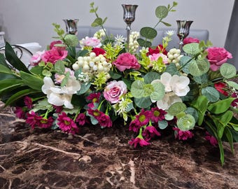 Centro de mesa elegante con jardín ruborizado