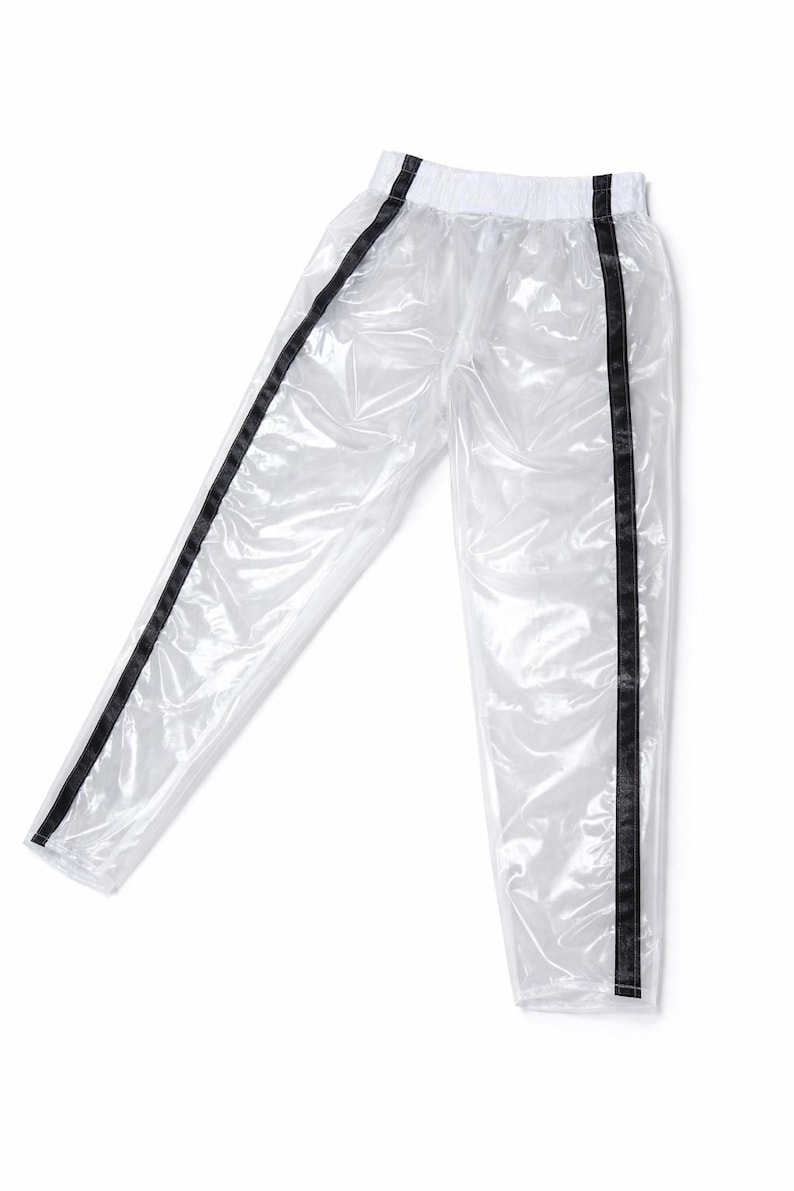 Pantalones de PVC transparentes para hombre con rayas negras imagen 1