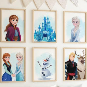 May include: Six framed watercolor prints featuring characters and a castle from the animated film. The prints include portraits of Anna, Elsa, Olaf, Kristoff, and Sven, along with a depiction of the castle. The frames are light wood.