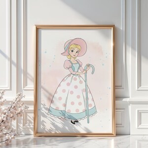 May include: Framed illustration of a cartoon character in a pink and white polka dot dress, holding a blue shepherd's crook. The character wears a pink hat and has blonde hair. The background is a soft pink watercolor wash.