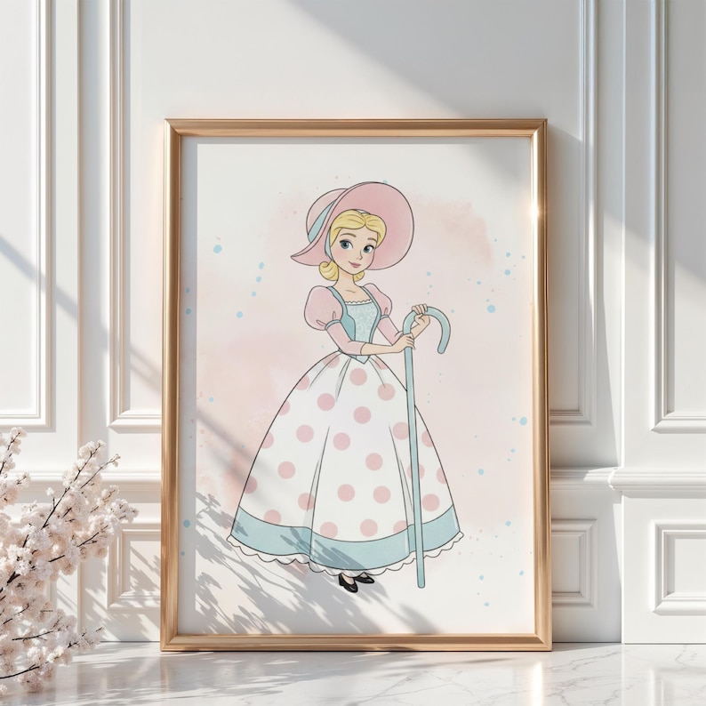 May include: Framed illustration of a cartoon character in a pink and white polka dot dress, holding a blue shepherd's crook. The character wears a pink hat and has blonde hair. The background is a soft pink watercolor wash.