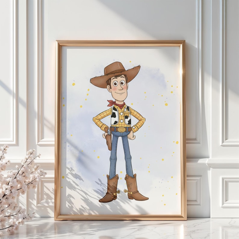 May include: A framed print featuring a cartoon illustration of a cowboy character. The character wears a brown cowboy hat, a yellow plaid shirt, a vest, blue jeans, and brown boots. The background has a watercolor effect with yellow splatters.